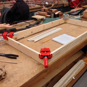 Gluing up the frame, built out of 1x4s. There's an additional thin "bezel" placed on top (not pictured).